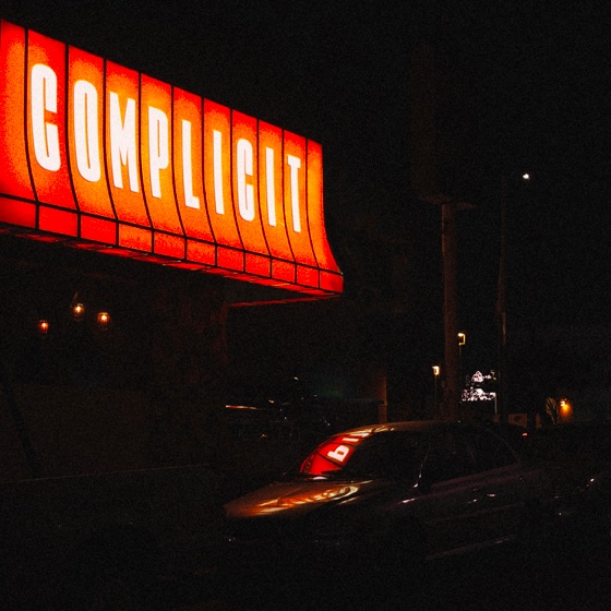 Cover artwork for Complicit