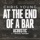 AT THE END OF A BAR