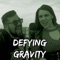 Defying Gravity (feat. Rebecca Parham) artwork