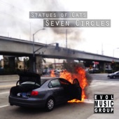 Seven Circles by Statues of Cats