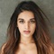 Follow Nidhhi Agerwal through her Official App smarturl