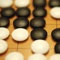 Gomoku (Five in a Row) is a strategy board game played on a go board